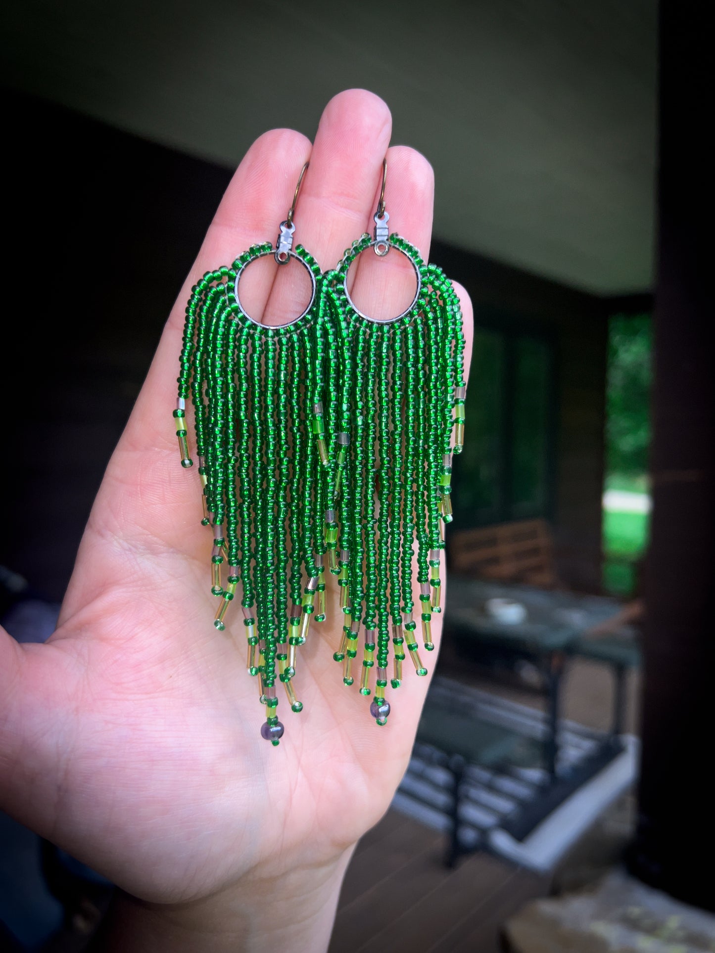 Green beaded earring dangles