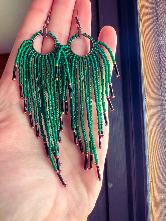 Green med length beaded earrings