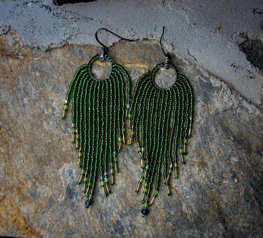 Green beaded earring dangles